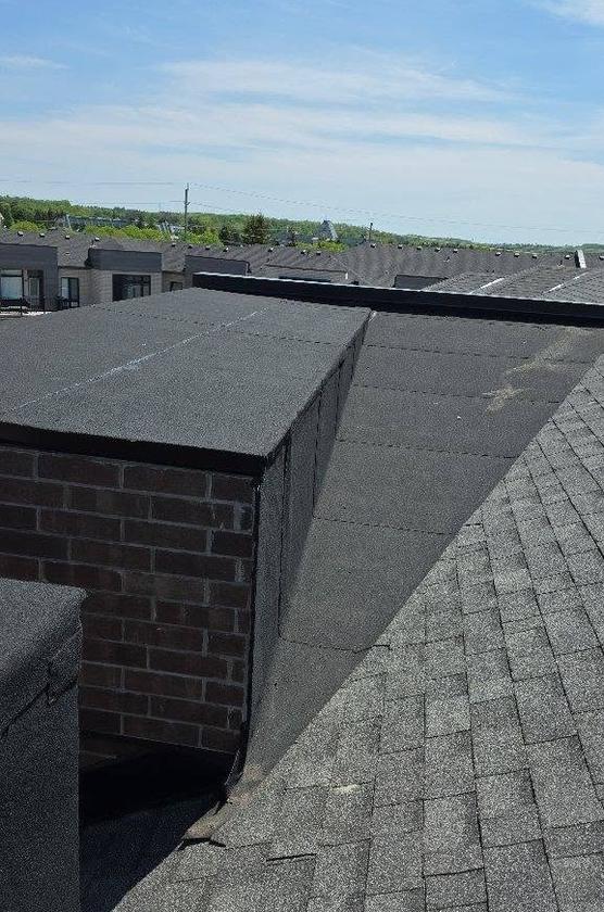 Completed Torch-On Flat Roof and Chimney Flashing